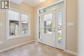 Owen Sound apartment for rent - A room with a white door and a window with white blinds.