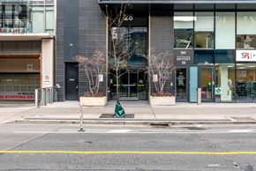 Toronto (Church-Yonge Corridor) condo for rent - A street view of a building with a no stopping sign.