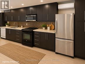 Toronto (Annex) apartment for rent - A modern kitchen with dark brown cabinets and stainless steel appliances.