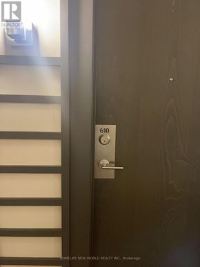 Toronto (Banbury-Don Mills) condo for rent - A door with a handle and a number 610 on it.