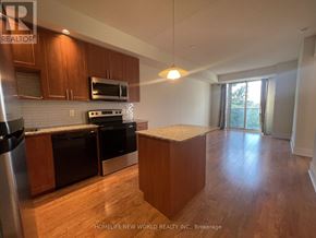 Toronto (Banbury-Don Mills) condo for rent - A kitchen with wooden cabinets and a stainless steel dishwasher.