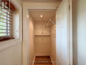 St. Catharines (Burleigh Hill) apartment for rent - A white bathroom with a window and a towel rack.
