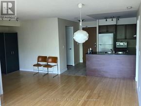 Toronto (Niagara) condo for rent - A room with a brown chair and a purple counter.
