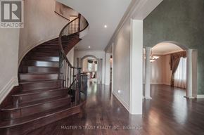 Mississauga (Lorne Park) apartment for rent - A large, empty house with a spiral staircase.