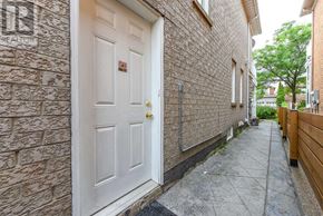 Brampton (Fletcher's Creek Village) apartment for rent - A hallway with a white door and a white wall.