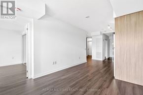 Toronto (Humber Heights) condo for rent - A room with white walls and wooden flooring.