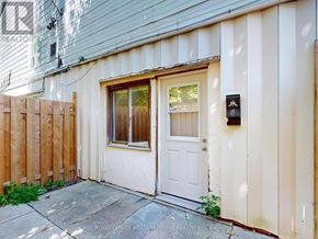 Halton Hills (Georgetown) multi-family for rent - A white door with a window above it and a mailbox to the right.