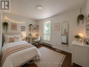 Guelph (Kortright East) apartment for rent - A bedroom with a bed, desk, and chair.