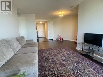 Mississauga (Hurontario) condo for rent - A living room with a television and a dining table.
