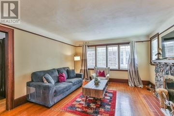 London East (East B) apartment for rent - A living room with a grey couch and a coffee table.