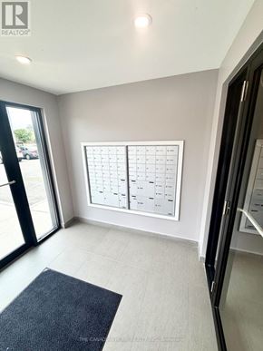 Windsor condo for rent - A realtor's office with a calendar on the wall.
