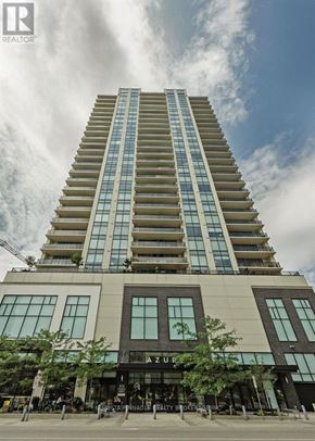 London East (East F) condo for rent - A tall building with a sign that says "Club" on it.