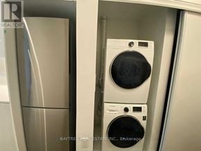 Toronto (Mount Pleasant West) condo for rent - A washer and dryer are in a small space.