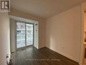 Toronto (Mount Pleasant West) condo for rent - A room with a sliding glass door leading to a balcony.