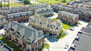 Oshawa (Windfields) townhouse for rent - A bird's eye view of a residential area with multiple apartment buildings.