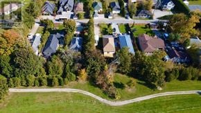 Innisfil apartment for rent - A residential area with houses and trees.