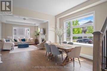Brampton (Credit Valley) apartment for rent - A well-lit living room with a dining table and chairs.