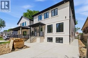 Windsor apartment for rent - A modern house with a large front yard is for sale.