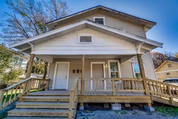 Corsicana apartment for rent - A house with a white door and a porch.
