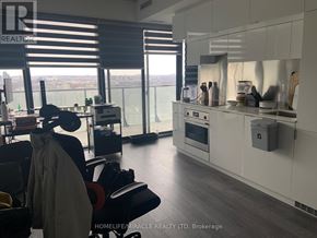 Toronto (Mount Pleasant West) condo for rent - A modern kitchen with a view of the city.