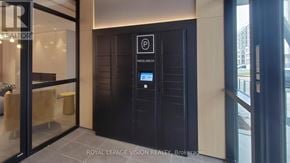 Milton (Cb Cobban) condo for rent - A parking sign is on a black door.
