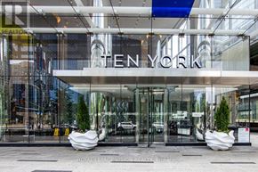Toronto (Waterfront Communities) condo for rent - The entrance to a building with the name "TEN YORK" on it.