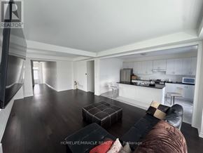Erin apartment for rent - A living room with a brown couch and a black coffee table.