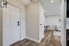 London South (South D) condo for rent - A room with a white door and a white chair.