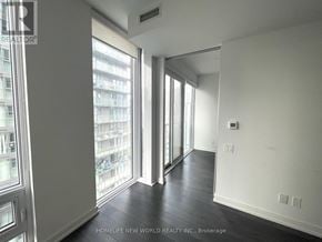 Toronto (Church-Yonge Corridor) condo for rent - A room with a view of a building outside through the windows.
