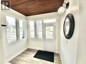 Belleville (Belleville Ward) apartment for rent - A sunny room with a black mat on the floor.