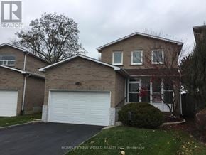 Markham (Raymerville) apartment for rent - A two-story house with a garage is for sale.