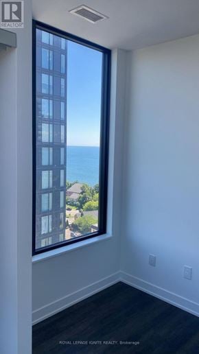 Burlington (Brant) condo for rent - A room with a large window overlooking the ocean.