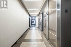 Toronto (Waterfront Communities) condo for rent - A kitchen with a microwave, oven, and stove top.