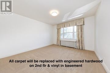 Toronto (Leaside) apartment for rent - A room with a window and a carpet that will be replaced with engineered hardwood.