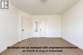 Toronto (Leaside) apartment for rent - A room with a carpeted floor and a note that says all carpet will be replaced with hardwood.