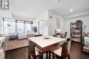 Toronto (Waterfront Communities) condo for rent - A well-lit dining area with a table and chairs is shown.