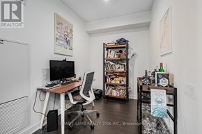 Toronto (Waterfront Communities) condo for rent - A room with a desk, chair, and bookshelf.