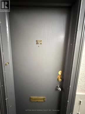 Toronto (Forest Hill South) house for rent - A door with the number 102 on it.
