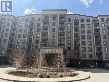 Oakville (Wm Westmount) condo for rent - A large apartment complex called Mint is shown in the image.