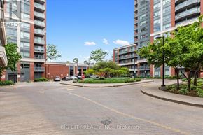 Markham (Unionville) condo for rent - A sunny day at a residential complex with a clear blue sky.