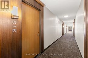 Markham (Unionville) condo for rent - A hallway with a door labeled 3121.