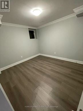 Milton (Wi Willmott) townhouse for rent - A room with wooden flooring and white walls.