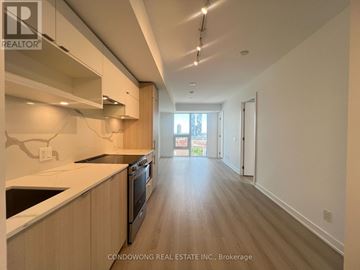 Toronto (Church-Yonge Corridor) condo for rent - A kitchen with a black dishwasher and stove top oven.