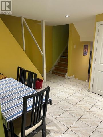 Toronto (Mount Olive-Silverstone-Jamestown) apartment for rent - A dining room with a table and chairs.