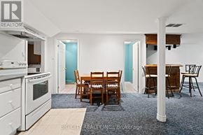 Markham (Old Markham Village) apartment for rent - A white kitchen with a dining table and chairs.