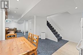 Markham (Old Markham Village) apartment for rent - A dining room with a wooden table and chairs.