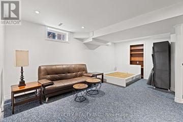 Markham (Old Markham Village) apartment for rent - A living room with a brown leather couch and a wooden coffee table.