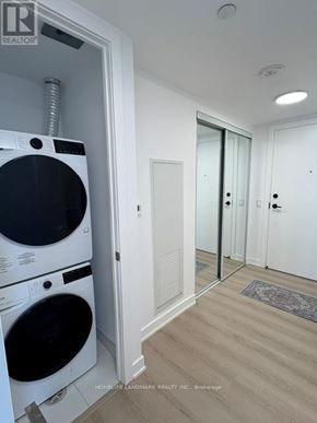 Toronto (Church-Yonge Corridor) condo for rent - A white washer and dryer in a laundry room.