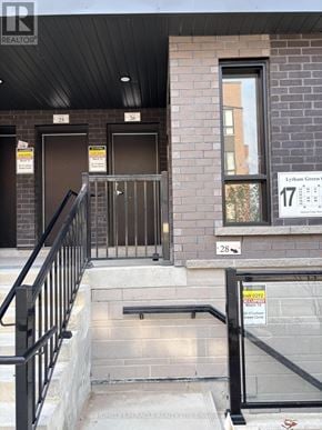 Newmarket (Glenway Estates) townhouse for rent - The entrance to a building with a sign that says "REALTOR".