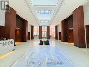 Toronto (Waterfront Communities) condo for rent - A hallway with a sign that says "LYF REALTY Brokerage" on the floor.